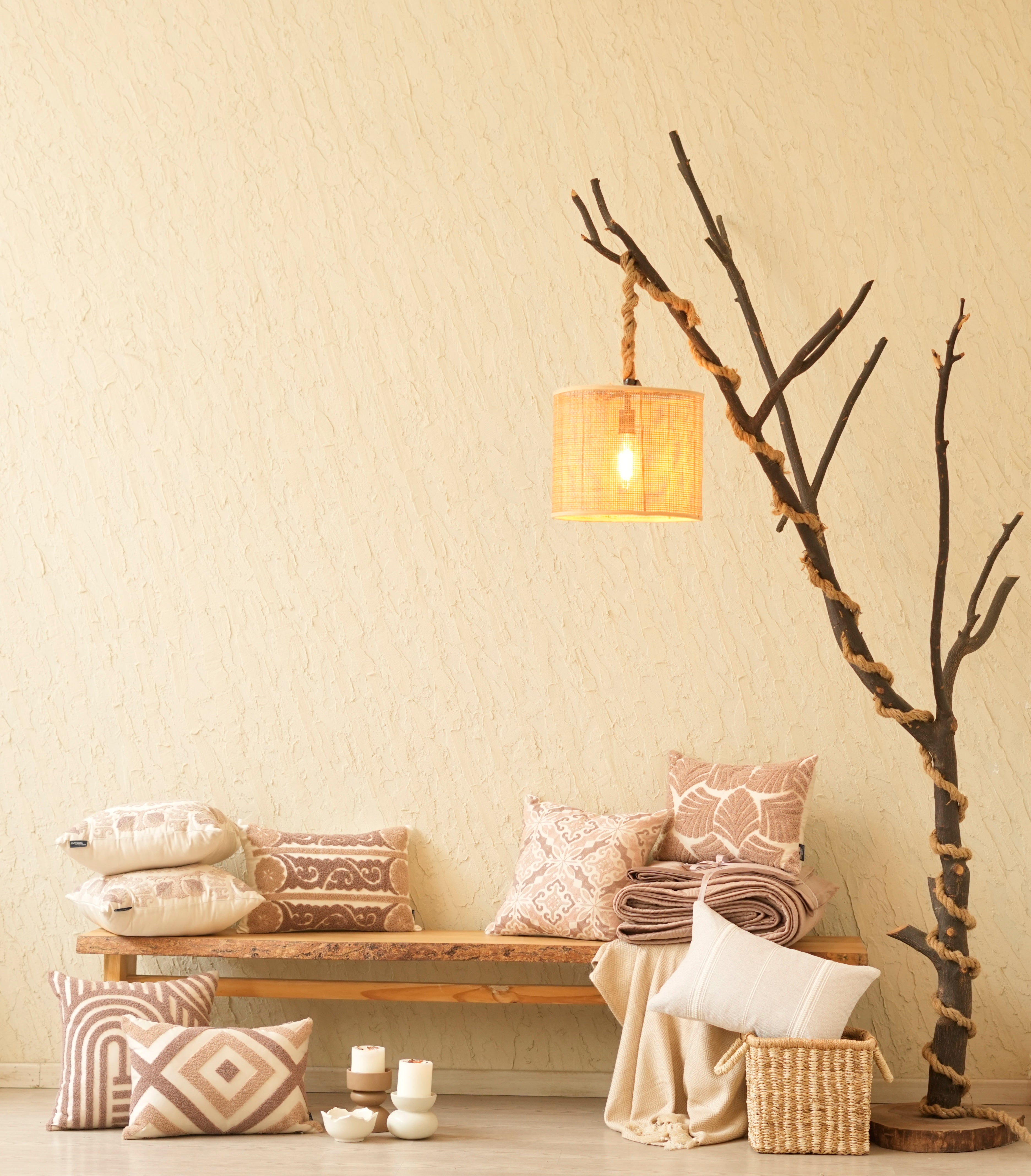 living room with decorative cushions on a wooden bench