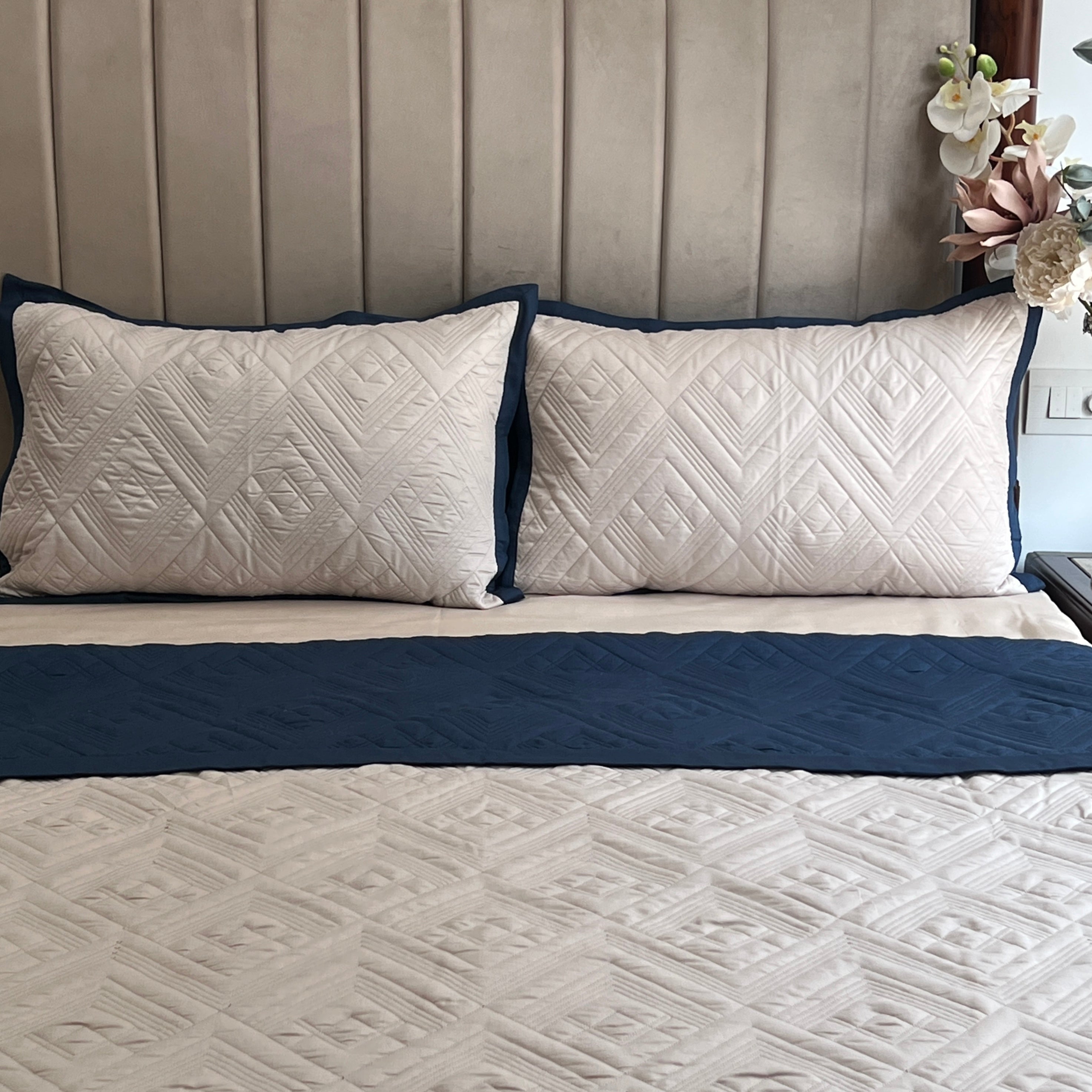 Quilted Navy and Ivory Cliff Reversible Bedspread