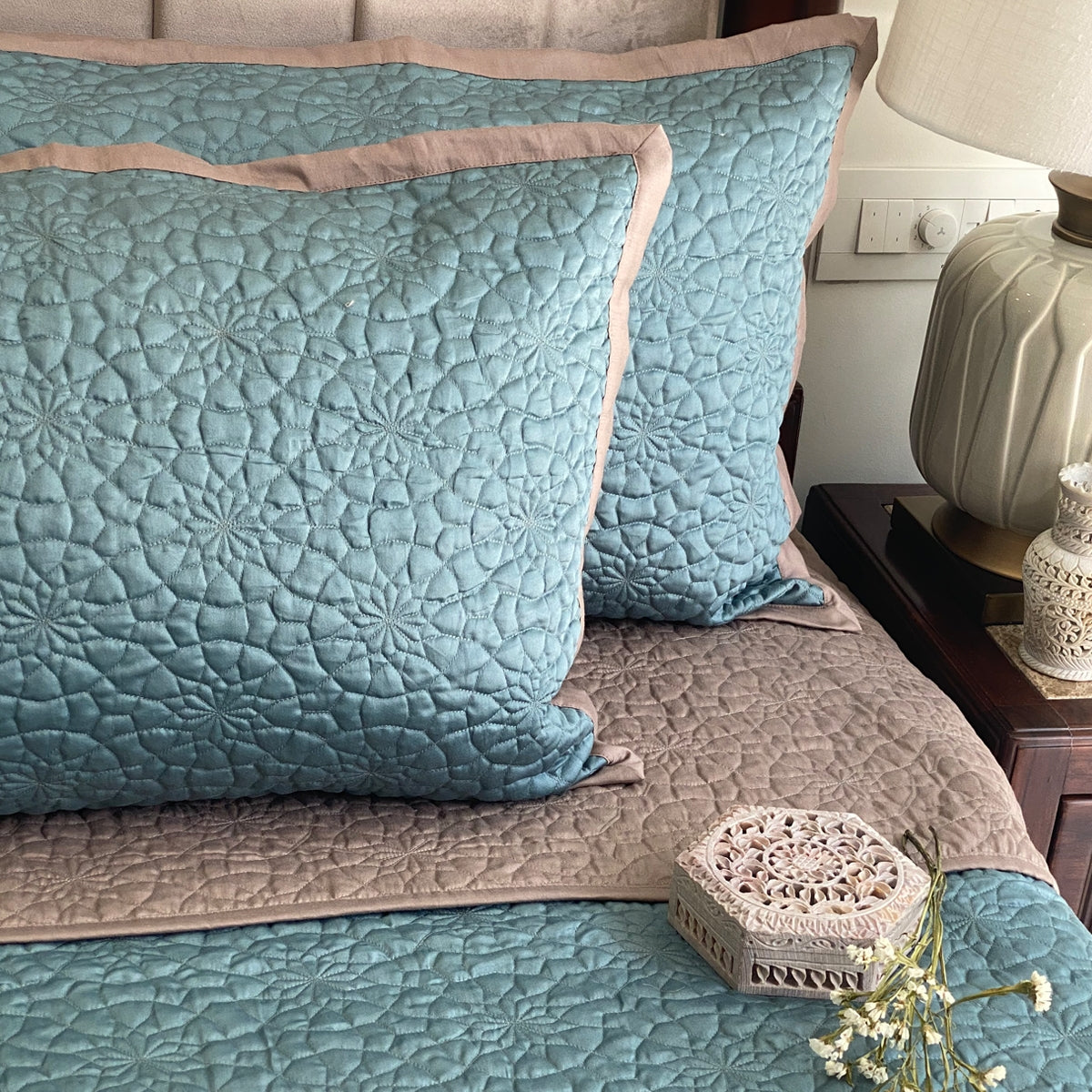 Teal and taupe bedspread